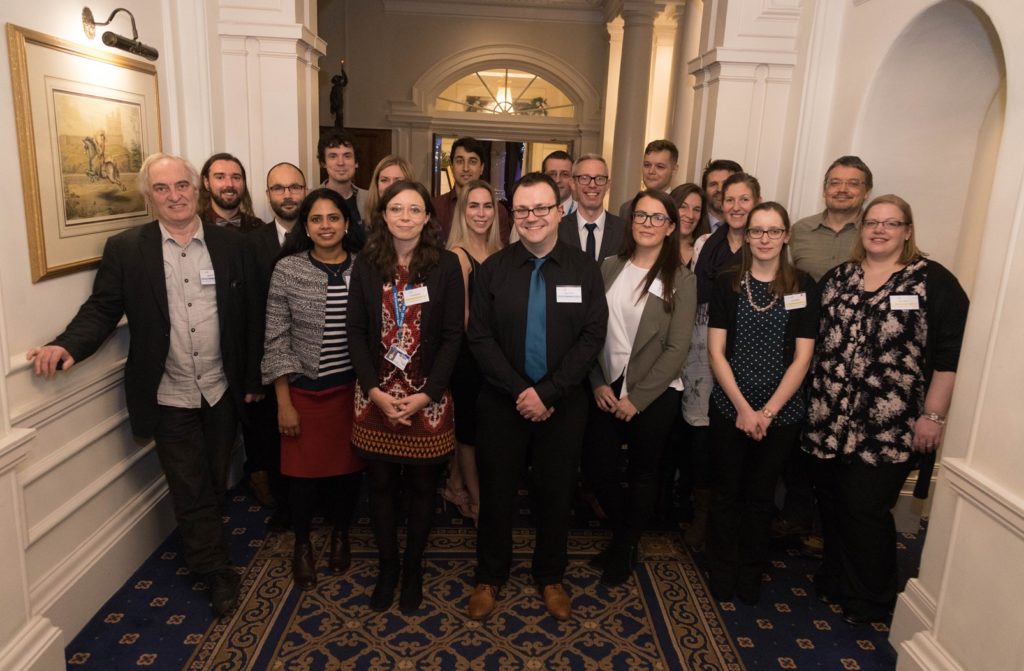 Group of people posing for the camera smiling